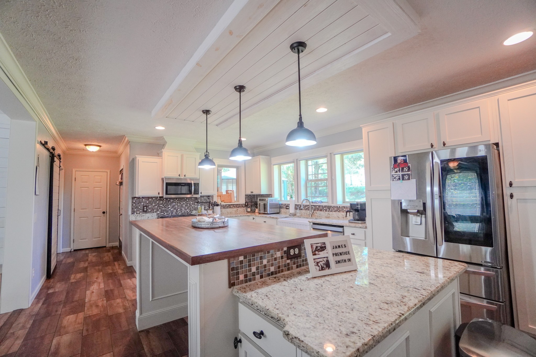 137 Hawkins Road Westmoreland, TN 37186 - Photo 33 of 70 a kitchen with a counter space cabinets and stainless steel appliances