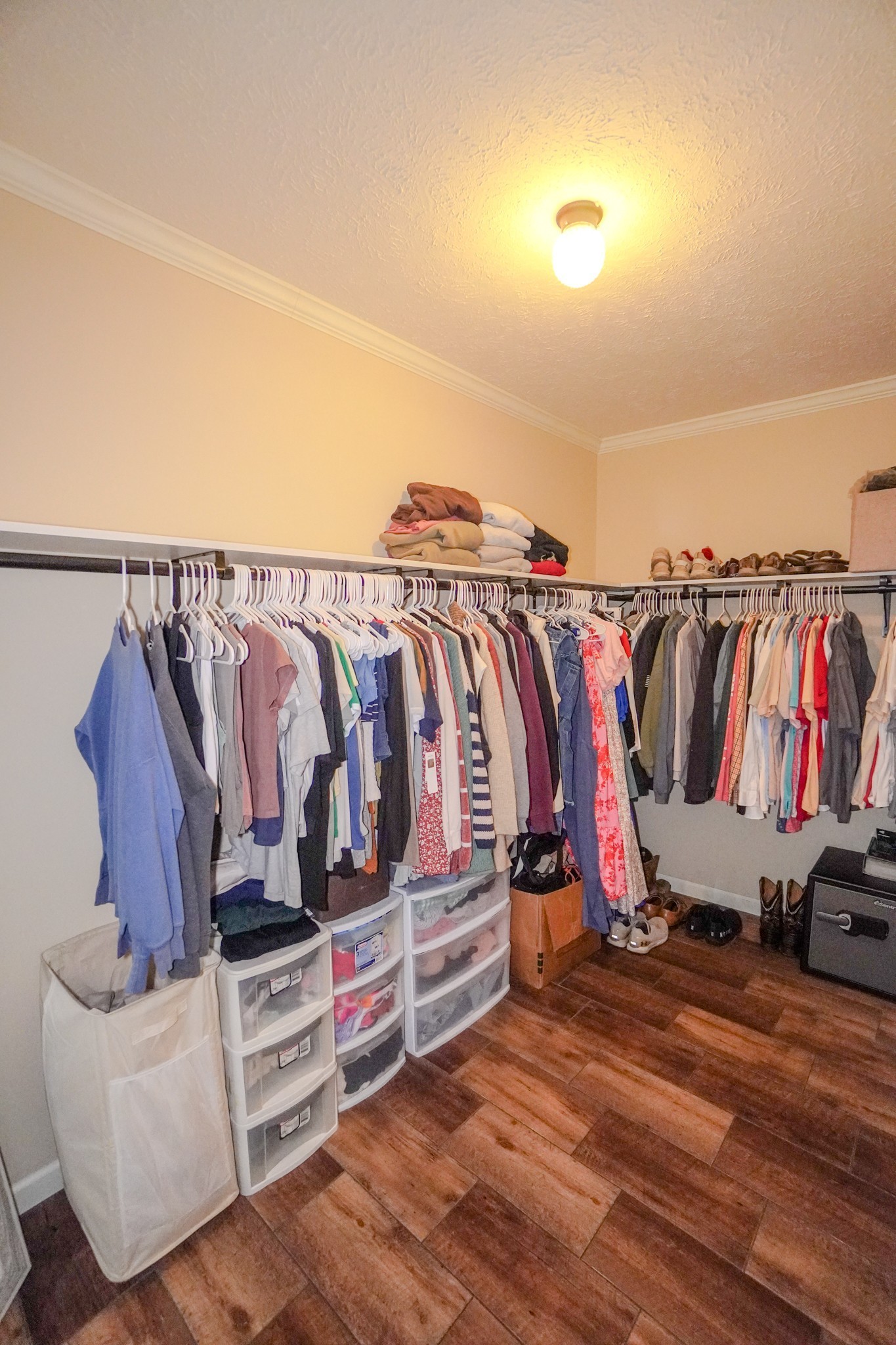 137 Hawkins Road Westmoreland, TN 37186 - Photo 60 of 70 a view of walk in closet with clothes and shoes