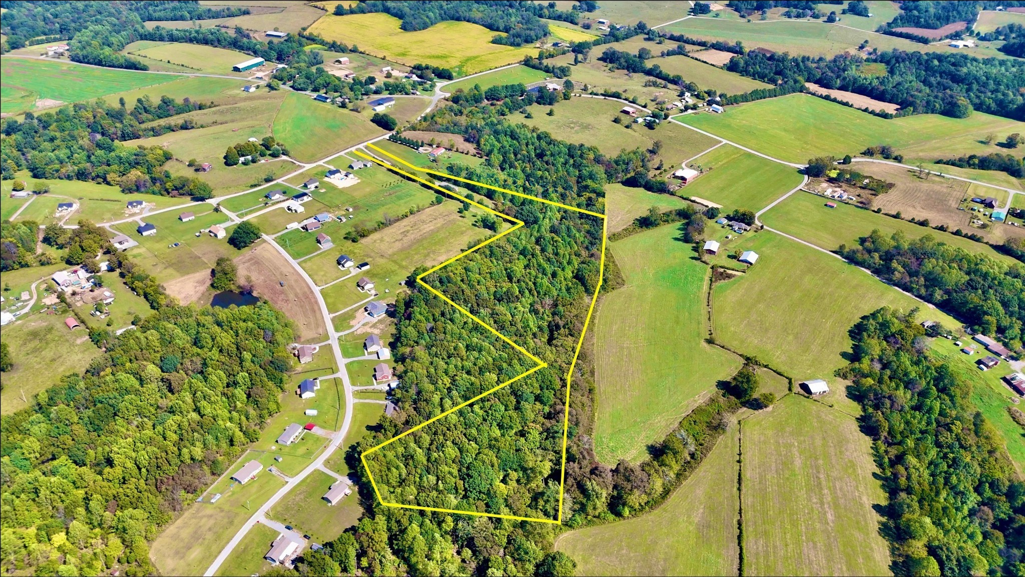 137 Hawkins Road Westmoreland, TN 37186 - Photo 69 of 70 an aerial view of a residential houses with outdoor space and street view
