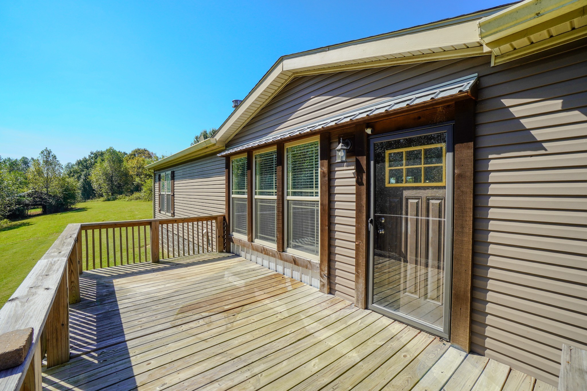 137 Hawkins Road Westmoreland, TN 37186 - Photo 8 of 70 a view of a wooden deck