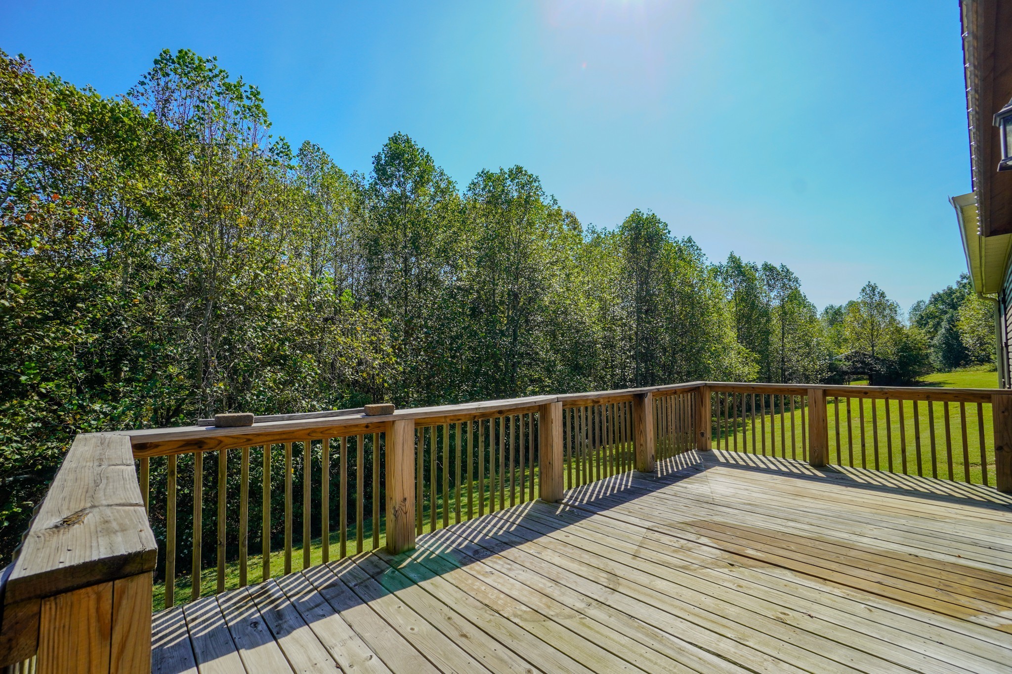 137 Hawkins Road Westmoreland, TN 37186 - Photo 9 of 70 a view of a wooden roof deck