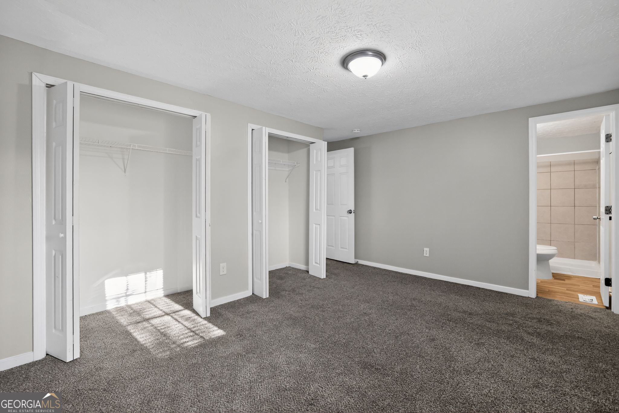 3798 Radcliffe Boulevard Decatur, GA 30034 - Photo 26 of 32 a view of an empty room with a window