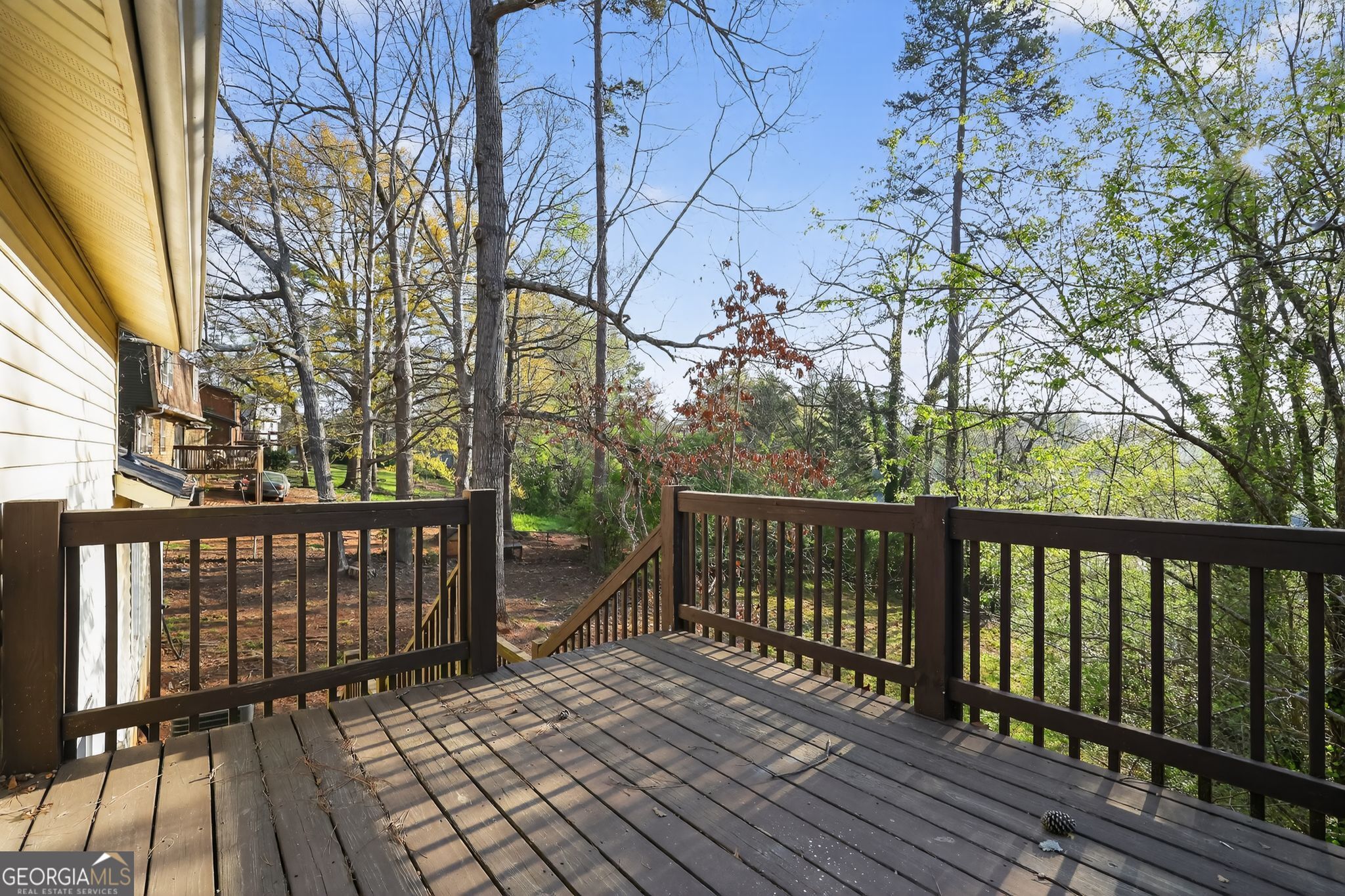 3798 Radcliffe Boulevard Decatur, GA 30034 - Photo 5 of 32 a view of a wooden roof deck