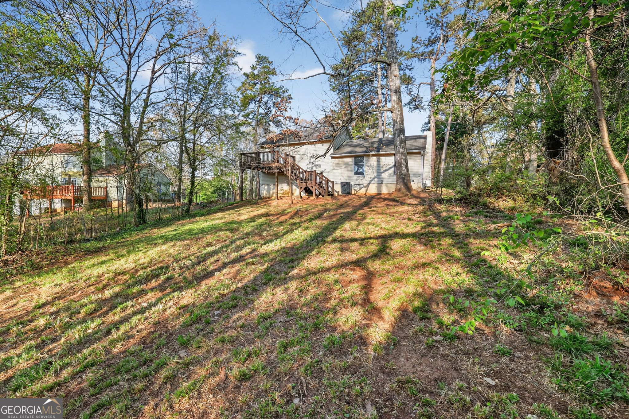 3798 Radcliffe Boulevard Decatur, GA 30034 - Photo 6 of 32 a view of a yard with plants and trees