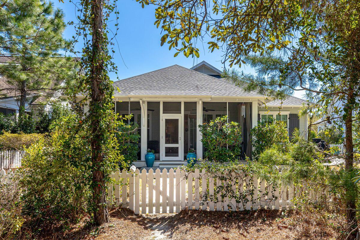 150 Medley Street Watersound, FL 32461 - Photo 20 of 30 a front view of a house with a garden
