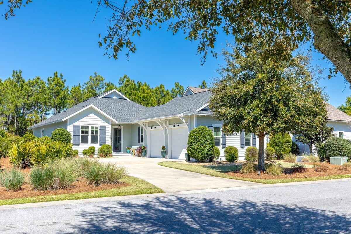 150 Medley Street Watersound, FL 32461 - Photo 21 of 30 a front view of a house with a yard