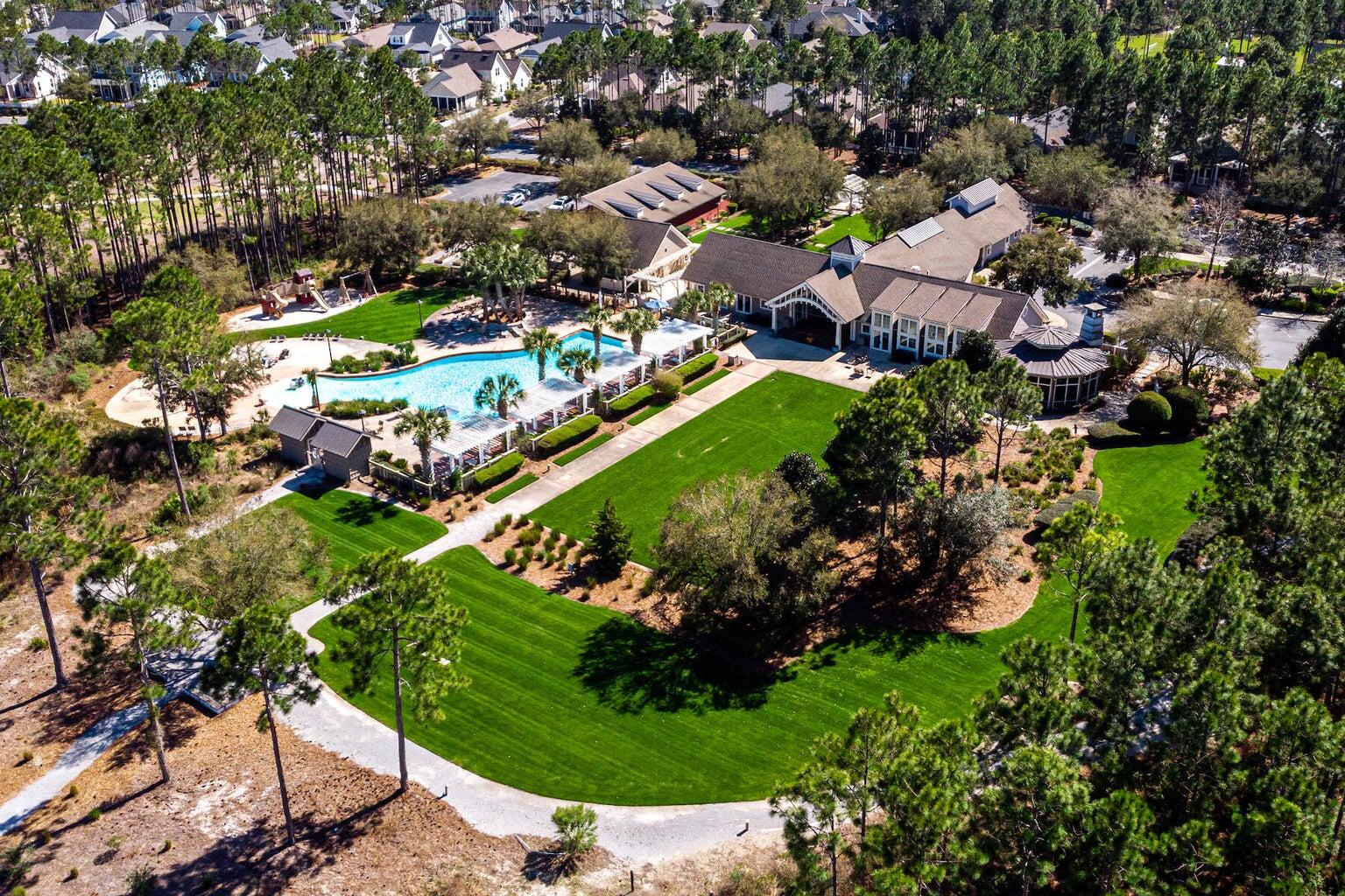 150 Medley Street Watersound, FL 32461 - Photo 26 of 30 an aerial view of a residential houses with outdoor space and trees all around