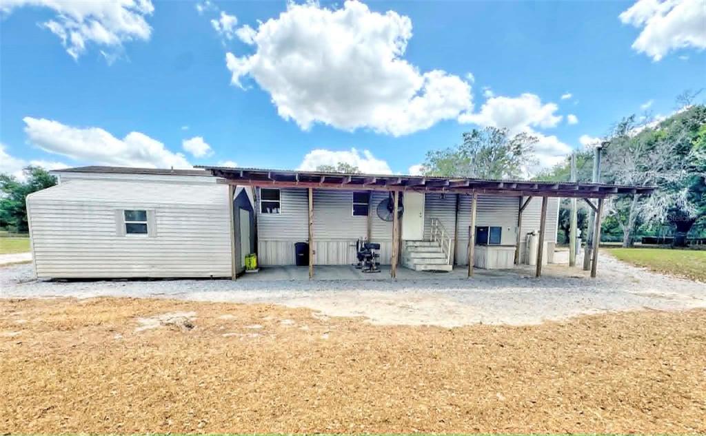612 Morgan Road Winter Haven, FL 33880 - Photo 16 of 38 a view of a house with a patio