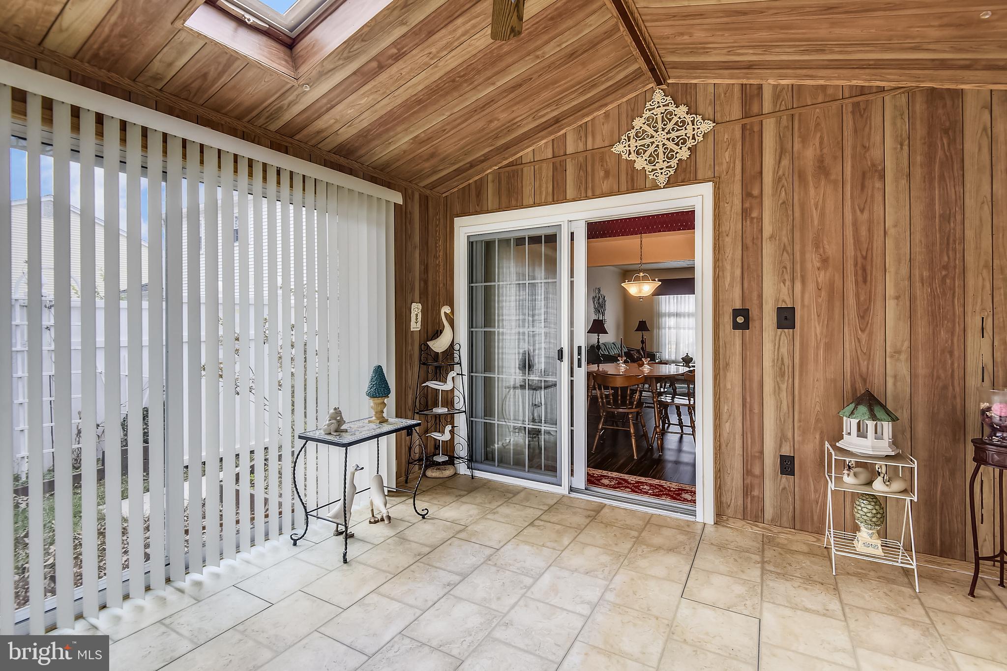 6807 Ben Franklin Road Springfield, VA 22150 - Photo 38 of 52 Screened porch with vaulted ceilings