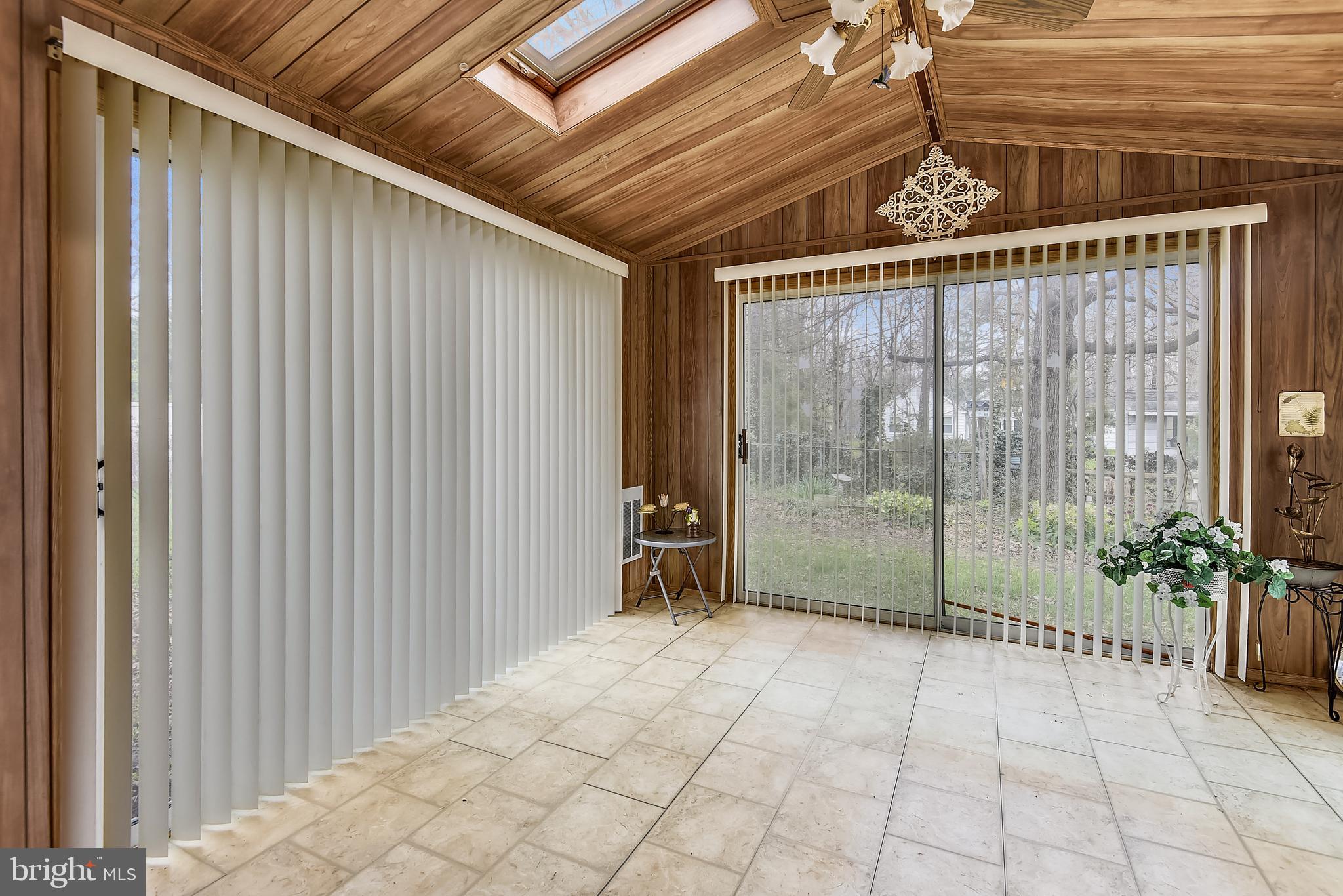 6807 Ben Franklin Road Springfield, VA 22150 - Photo 39 of 52 Screened porch with skylights