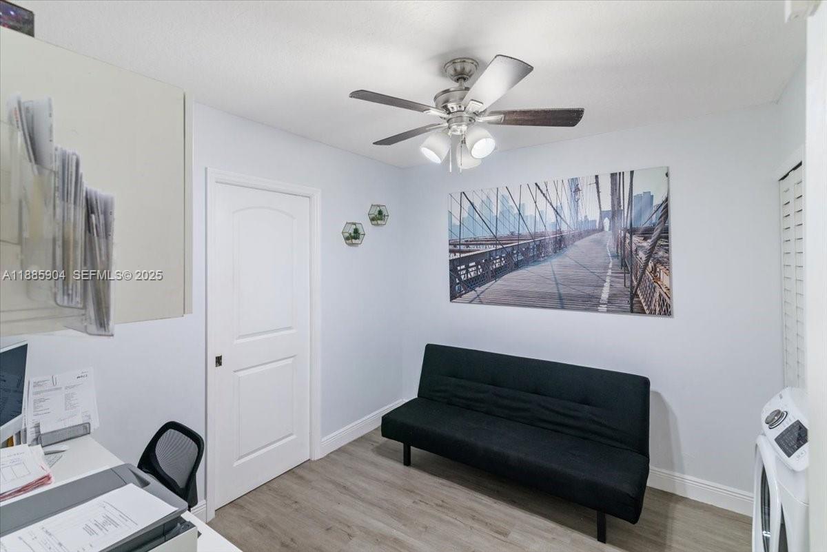 14500 Southwest 173rd Street Miami, FL 33177 - Photo 20 of 47 a view of entryway and hall with wooden floor
