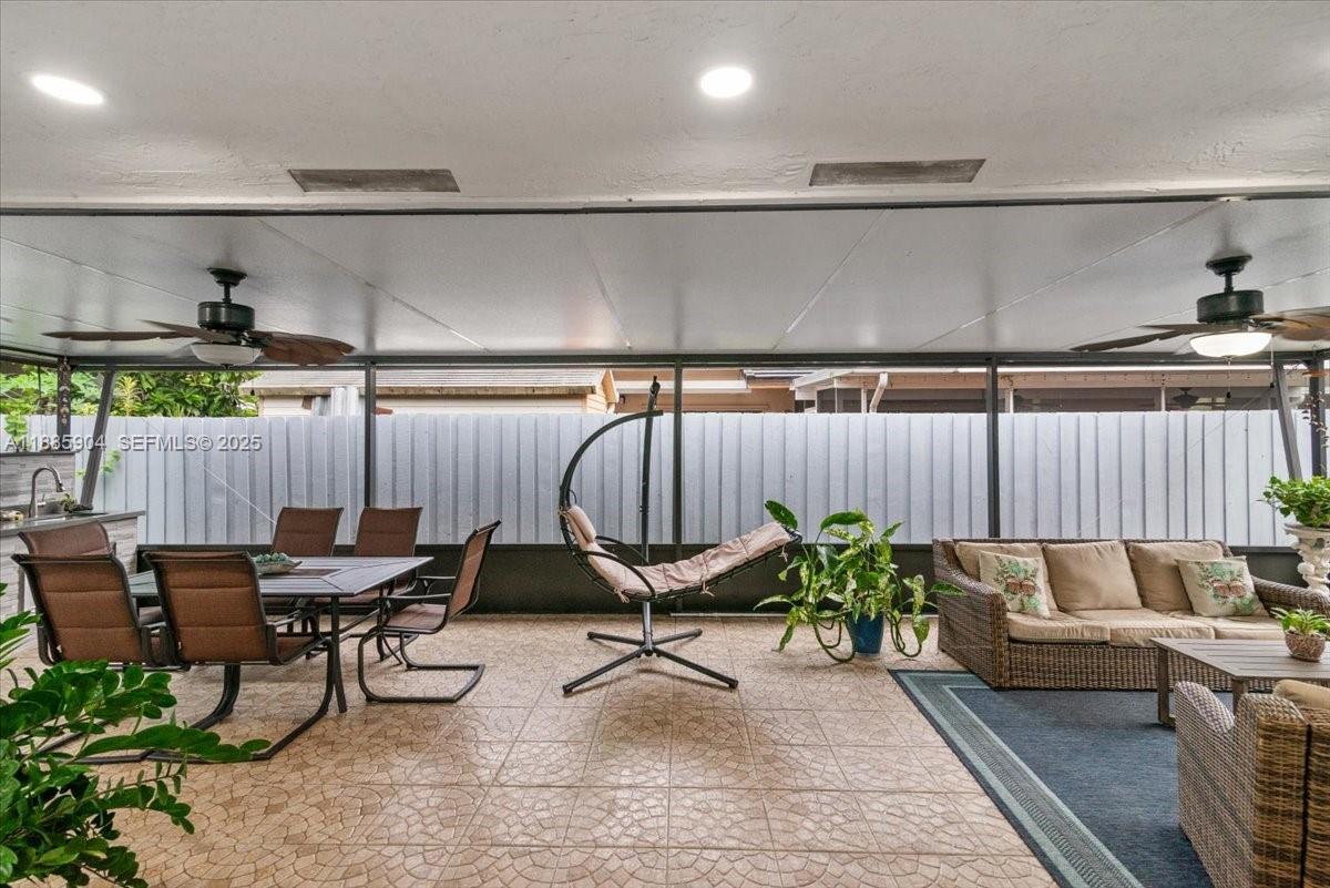 14500 Southwest 173rd Street Miami, FL 33177 - Photo 33 of 47 a reading room with furniture and a wooden floor