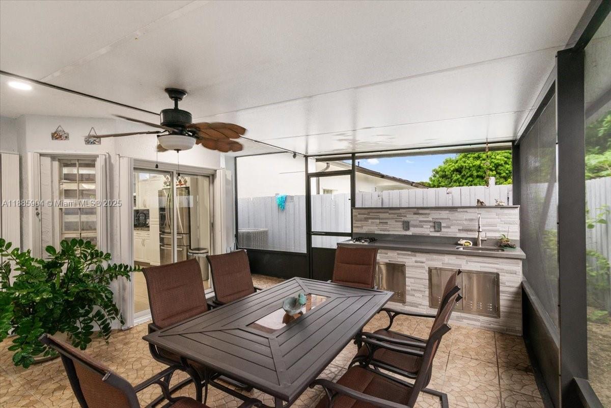 14500 Southwest 173rd Street Miami, FL 33177 - Photo 36 of 47 a living room with furniture and a window
