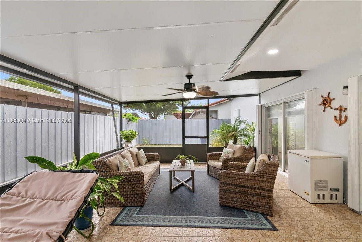 14500 Southwest 173rd Street Miami, FL 33177 - Photo 38 of 47 a living room with furniture and a potted plant