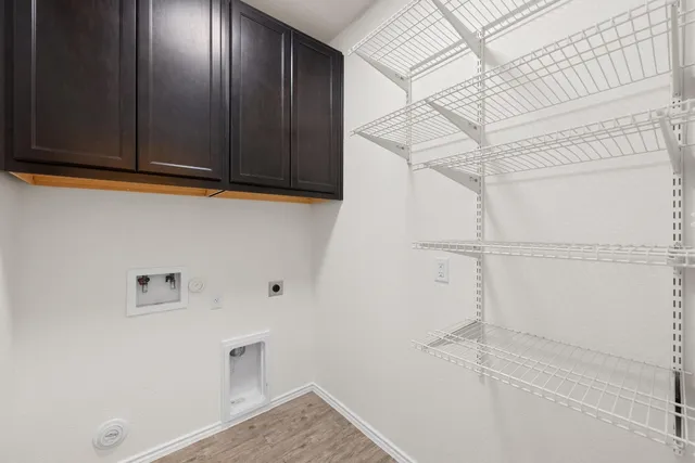 a view of a backyard with large trees