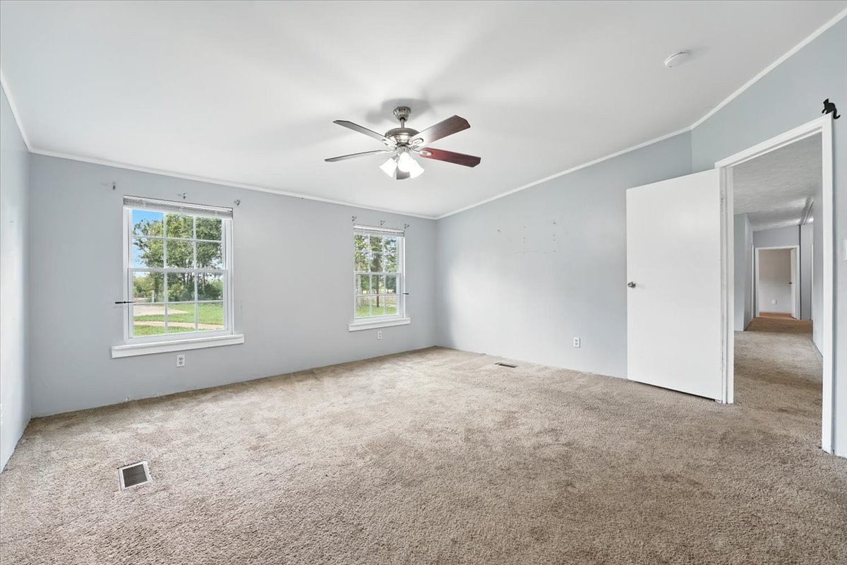 9484 Rocky Hill Road Lascassas, TN 37085 - Photo 18 of 38 wooden floor in an empty room with a window