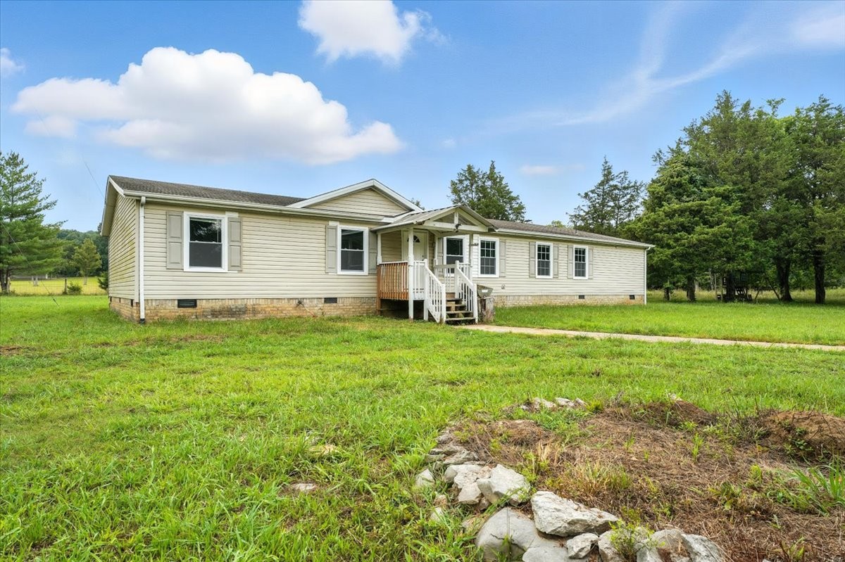 9484 Rocky Hill Road Lascassas, TN 37085 - Photo 2 of 38 a view of a house with a yard