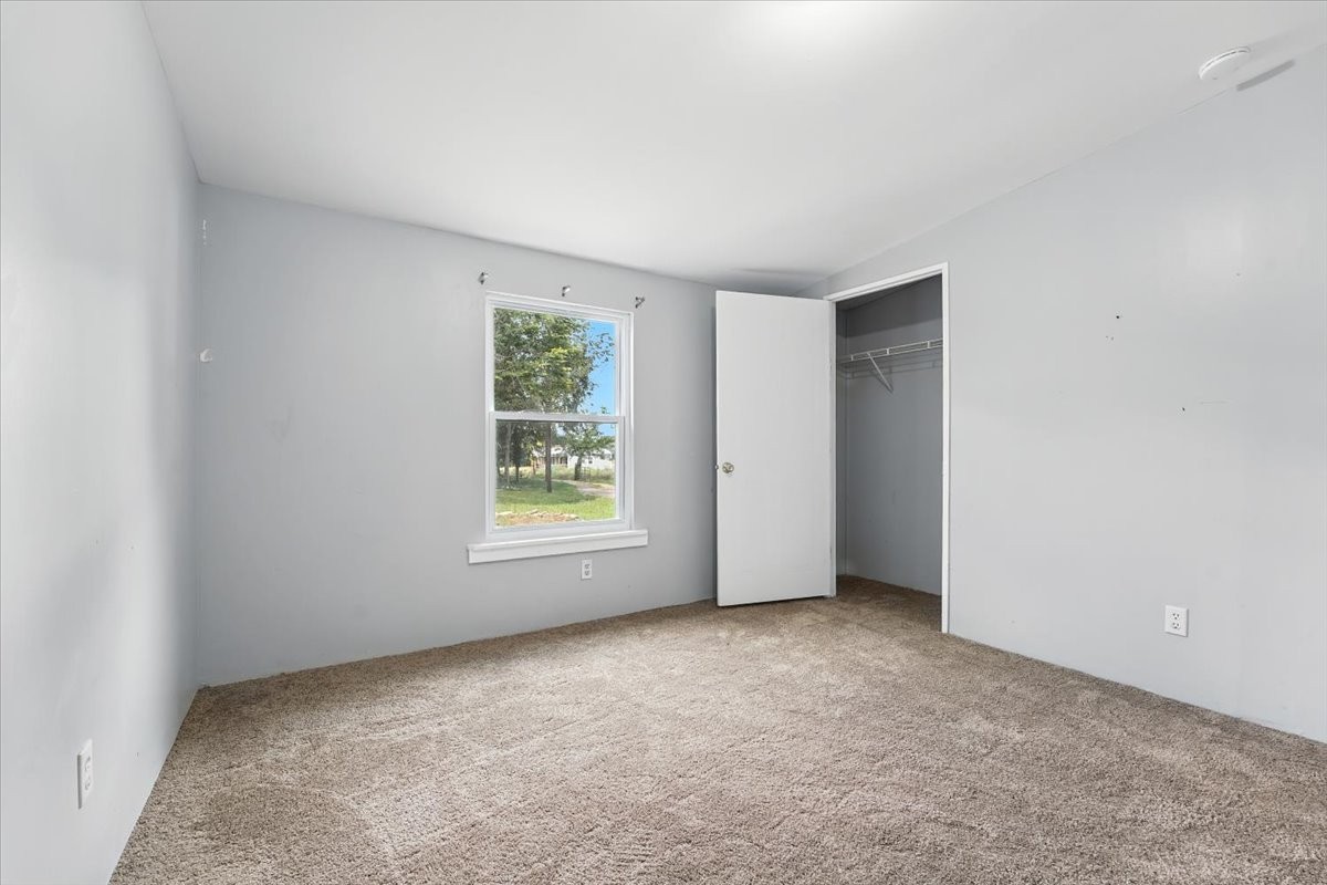 9484 Rocky Hill Road Lascassas, TN 37085 - Photo 23 of 38 an empty room with windows