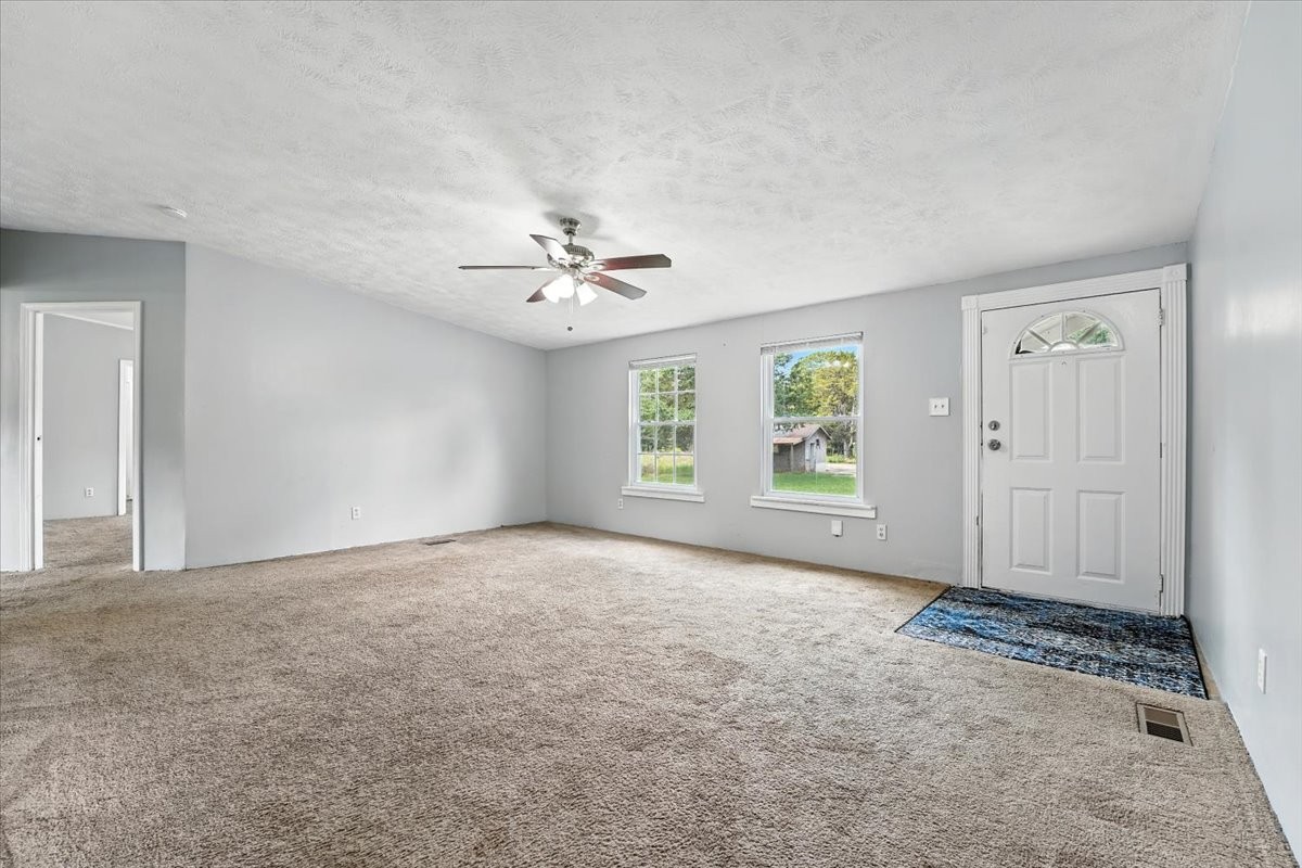 9484 Rocky Hill Road Lascassas, TN 37085 - Photo 6 of 38 a view of an empty room with a window