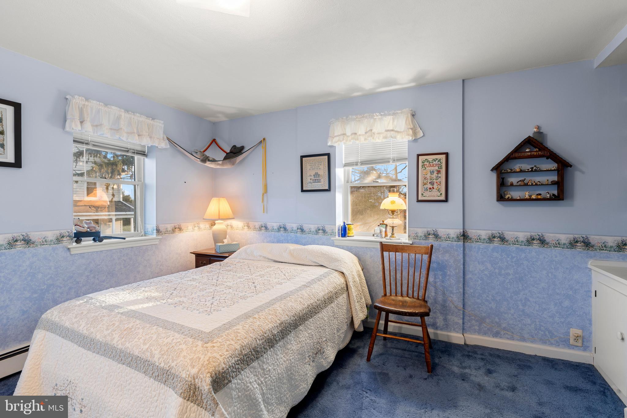 954 Anderson Ferry Road Mount Joy, PA 17552 - Photo 20 of 40 a bedroom with a bed and wooden floor