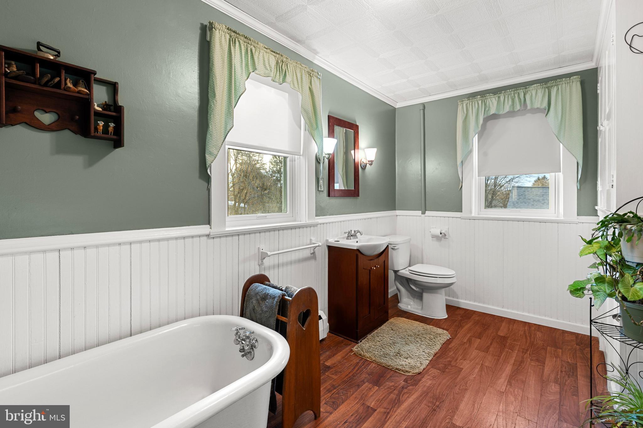 954 Anderson Ferry Road Mount Joy, PA 17552 - Photo 26 of 40 a bathroom with a bathtub sink and mirror