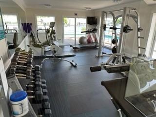 Undisclosed Address Fort Lauderdale, FL 33306 - Photo 17 of 26 a view of a room with gym equipment