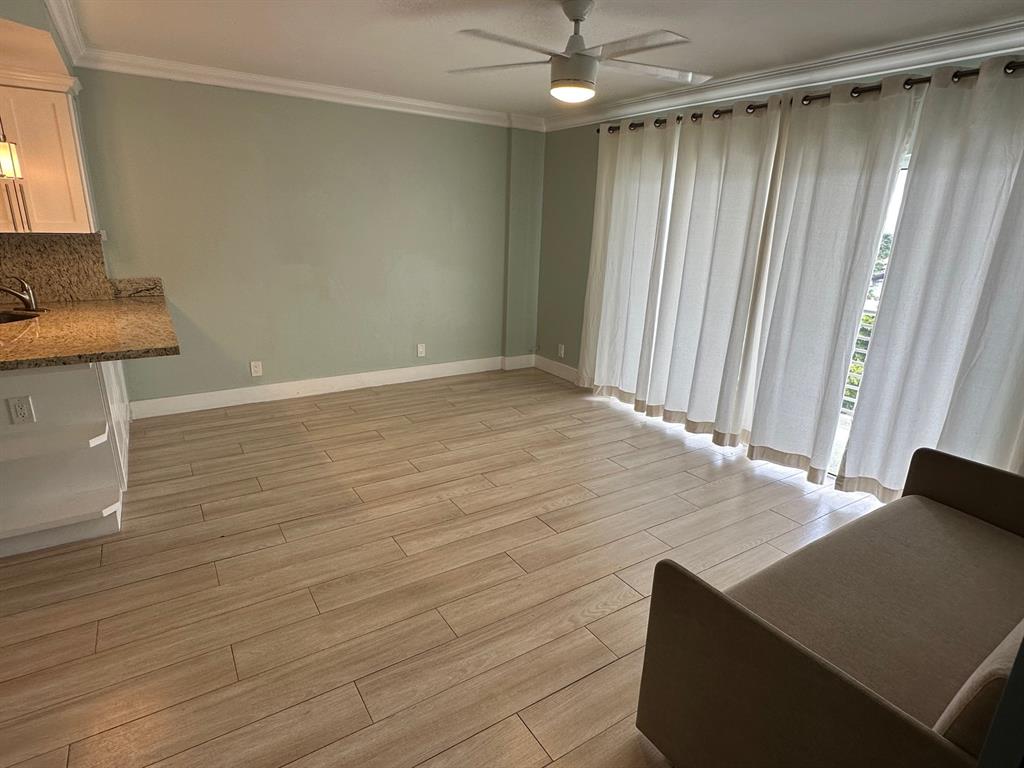 Undisclosed Address Fort Lauderdale, FL 33306 - Photo 7 of 26 a view of a room with wooden floor