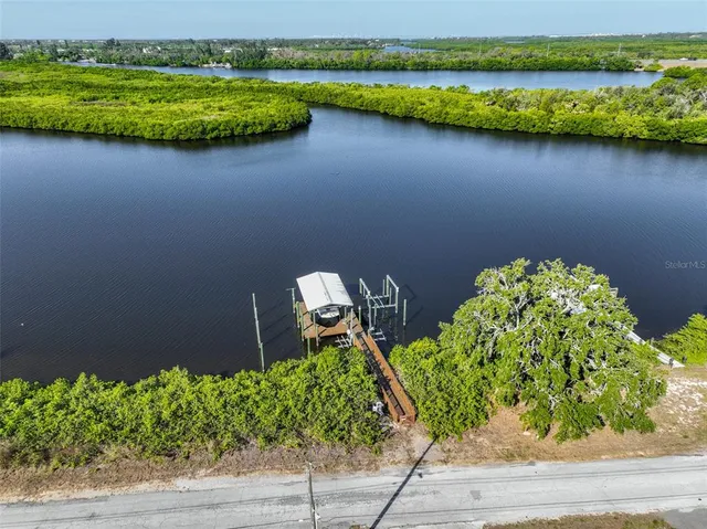 a backyard of a house with a lake and lake view