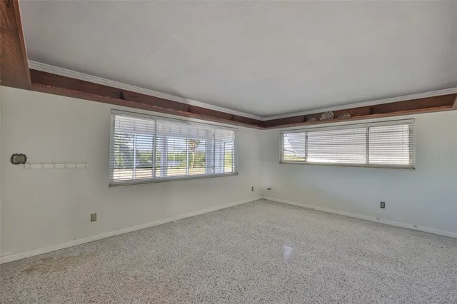 a green field with lots of trees