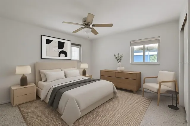 a view of a lake with a table and chairs