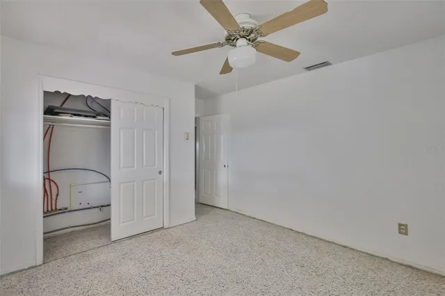 an aerial view of residential house with outdoor space and parking