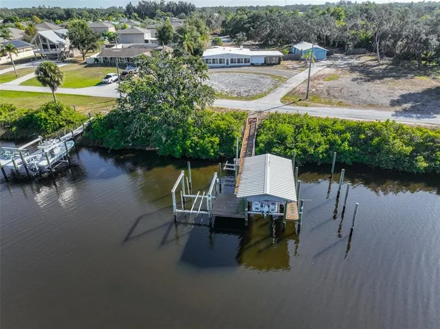 an aerial view of a house with a garden