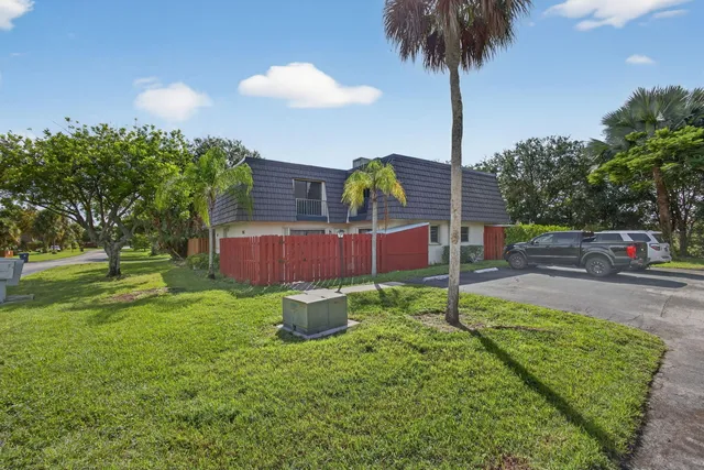 a house view with a garden space