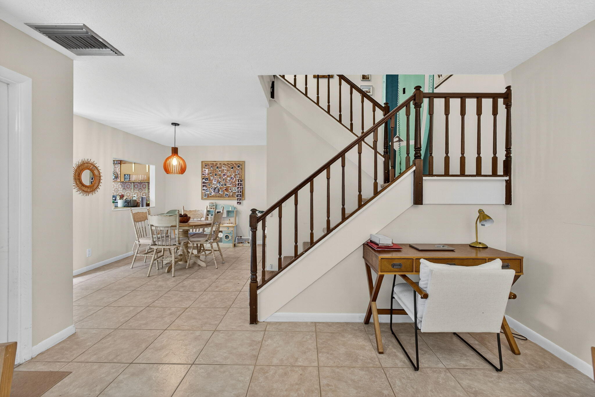 326 Jupiter Lakes Boulevard, Unit 2310C Jupiter, FL 33458 - Photo 13 of 46 a view of a hallway with seating area