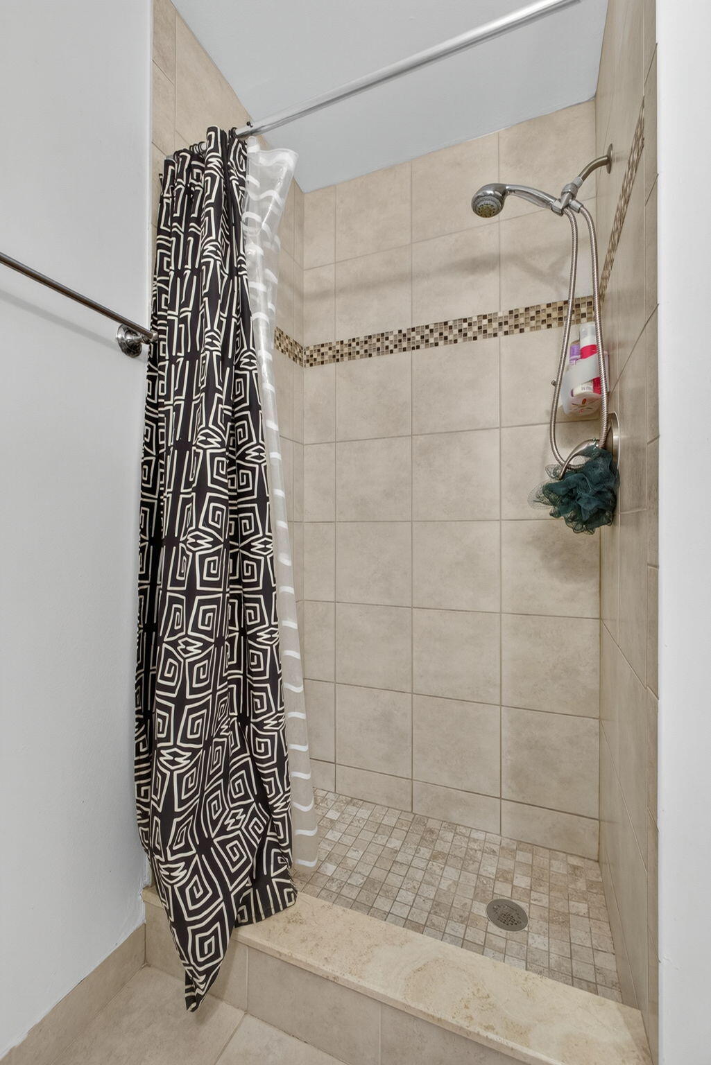 326 Jupiter Lakes Boulevard, Unit 2310C Jupiter, FL 33458 - Photo 39 of 46 a bathroom with a shower