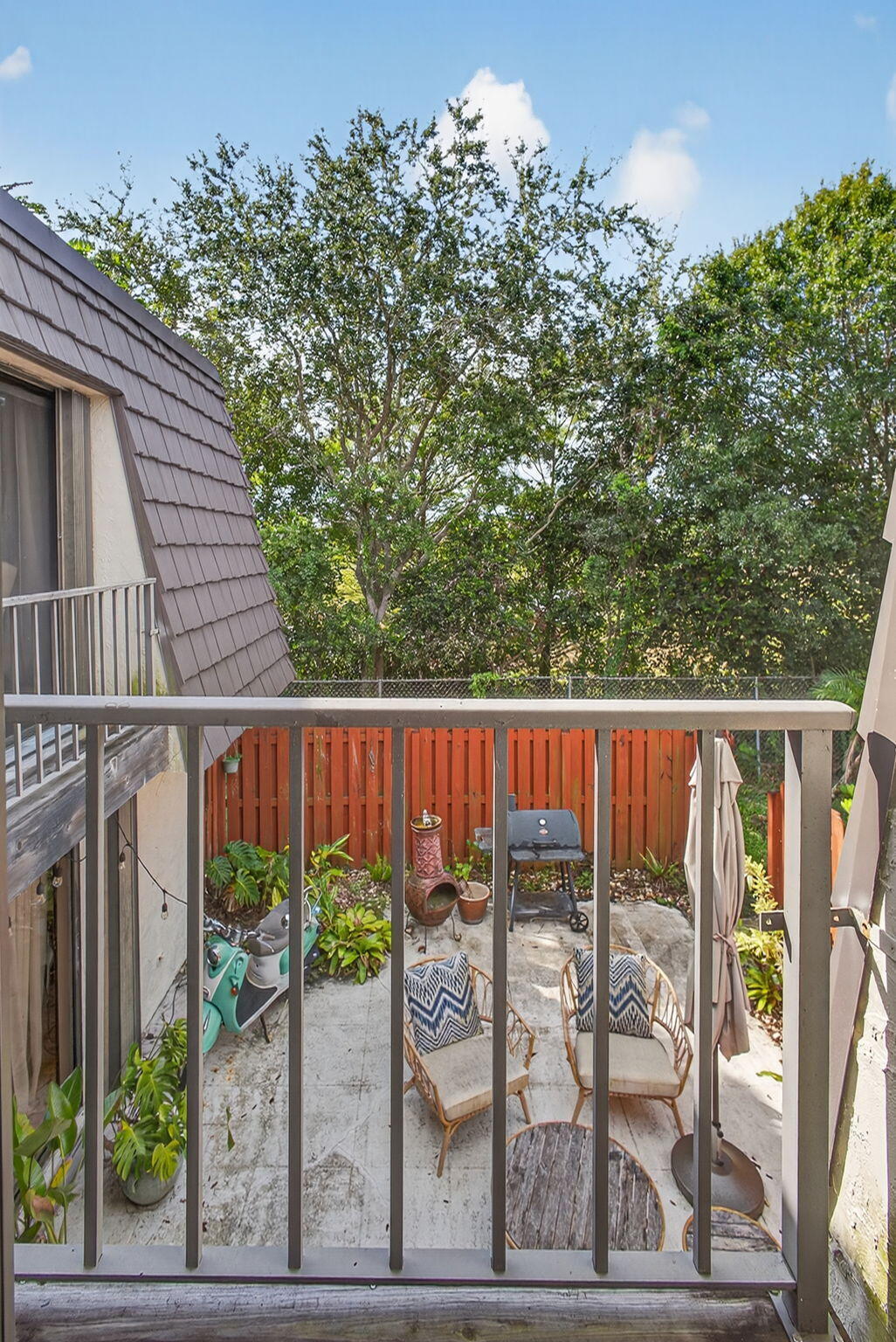 326 Jupiter Lakes Boulevard, Unit 2310C Jupiter, FL 33458 - Photo 44 of 46 a view of a wooden fence
