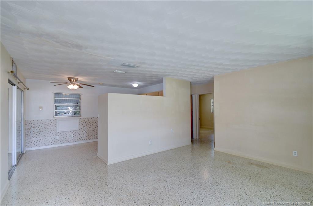 4651 Southeast Chatham Avenue Stuart, FL 34997 - Photo 3 of 49 a view of a big room with closet and windows
