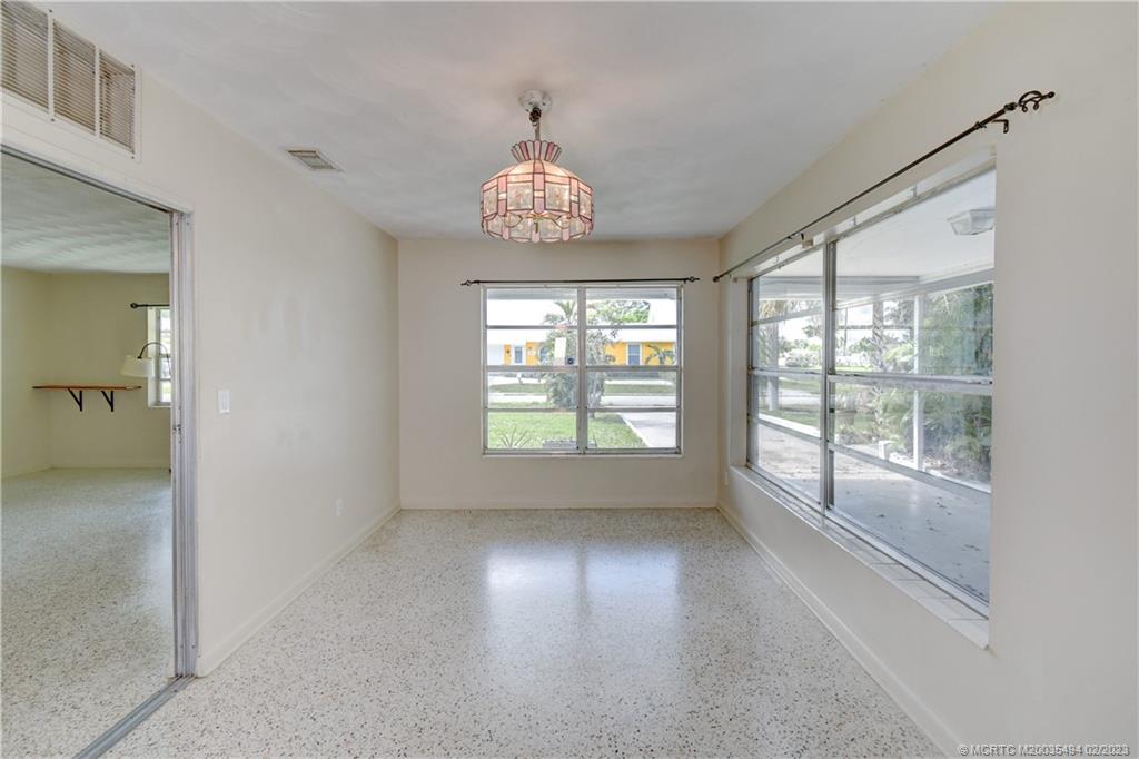 4651 Southeast Chatham Avenue Stuart, FL 34997 - Photo 39 of 49 a view of an empty room with a window