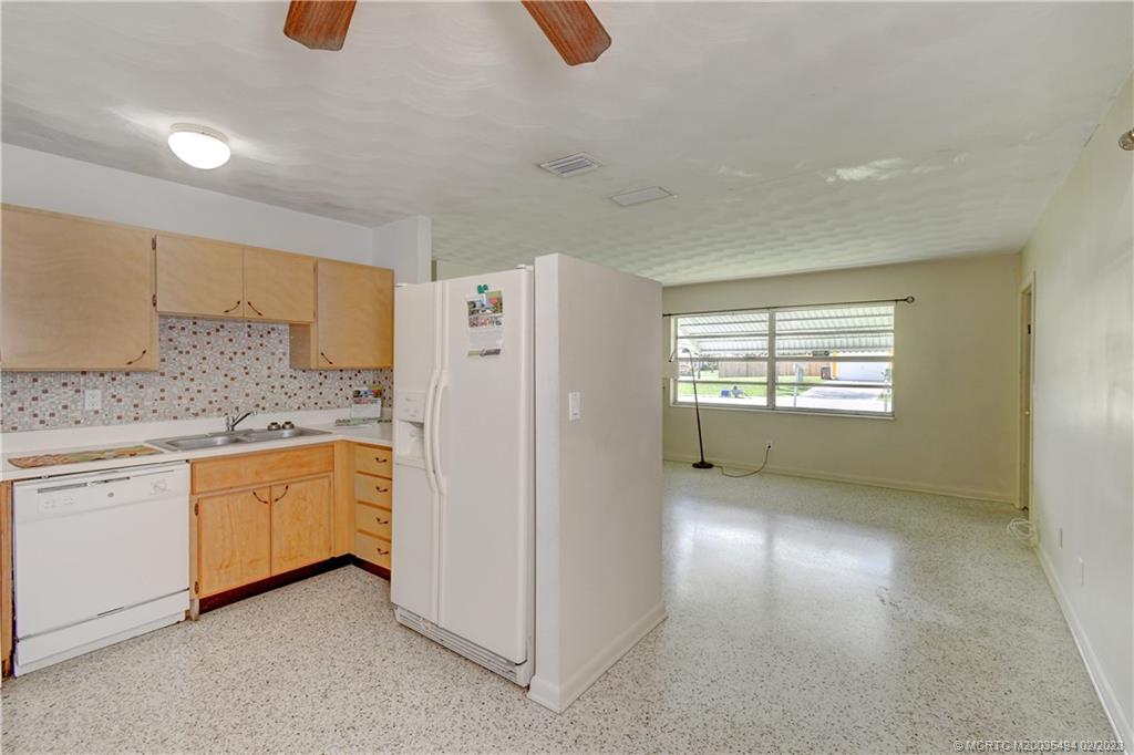4651 Southeast Chatham Avenue Stuart, FL 34997 - Photo 4 of 49 a view of a kitchen with appliances