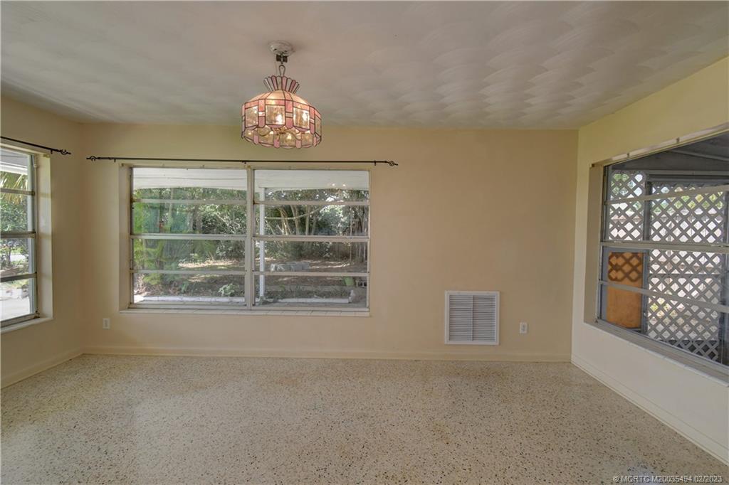 4651 Southeast Chatham Avenue Stuart, FL 34997 - Photo 43 of 49 a view of an empty room with a window