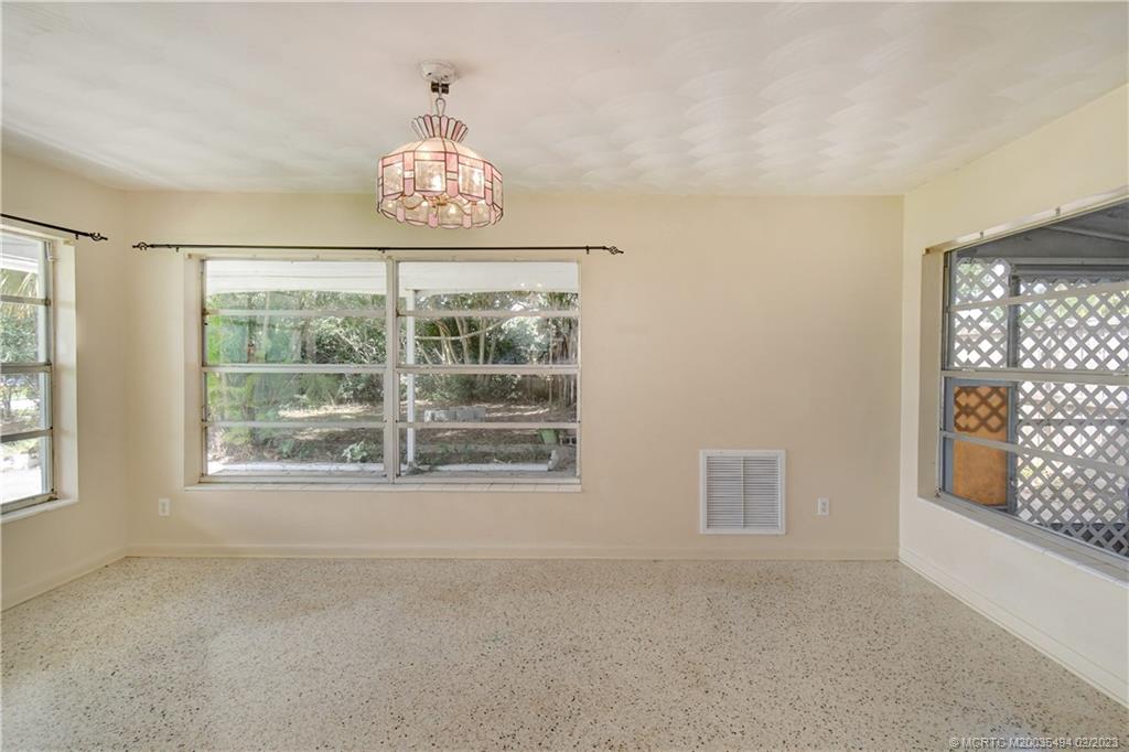 4651 Southeast Chatham Avenue Stuart, FL 34997 - Photo 44 of 49 a view of an empty room with a window
