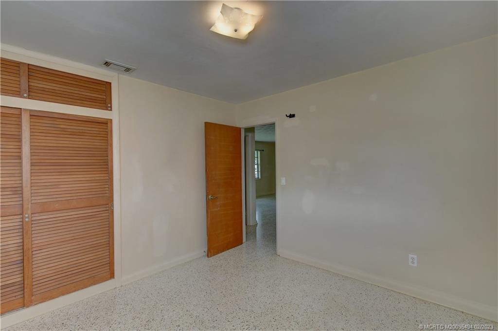 4651 Southeast Chatham Avenue Stuart, FL 34997 - Photo 7 of 49 a view of an empty room