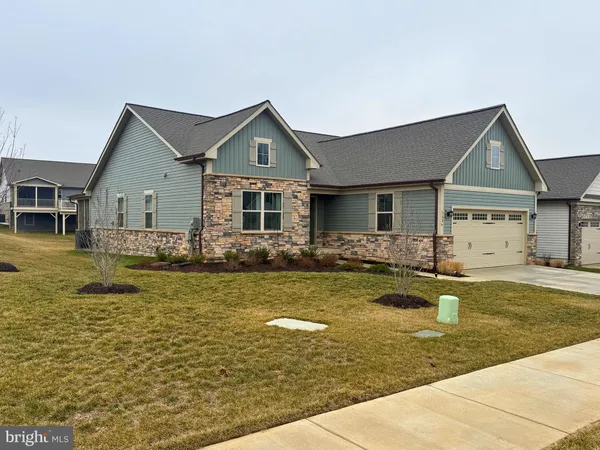 a front view of a house with swimming pool