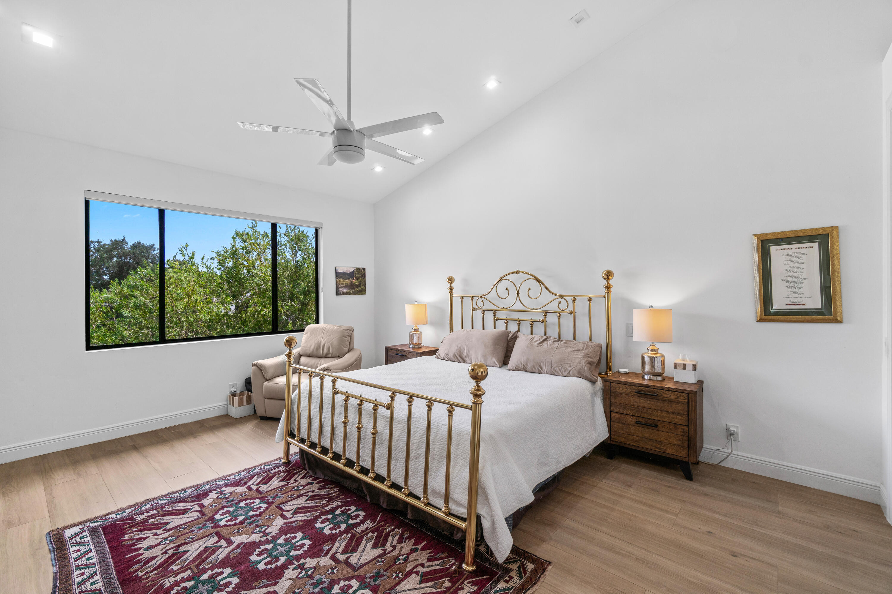 17557 Ashbourne Lane, Unit B Boca Raton, FL 33496 - Photo 19 of 41 a bedroom with a bed and a window