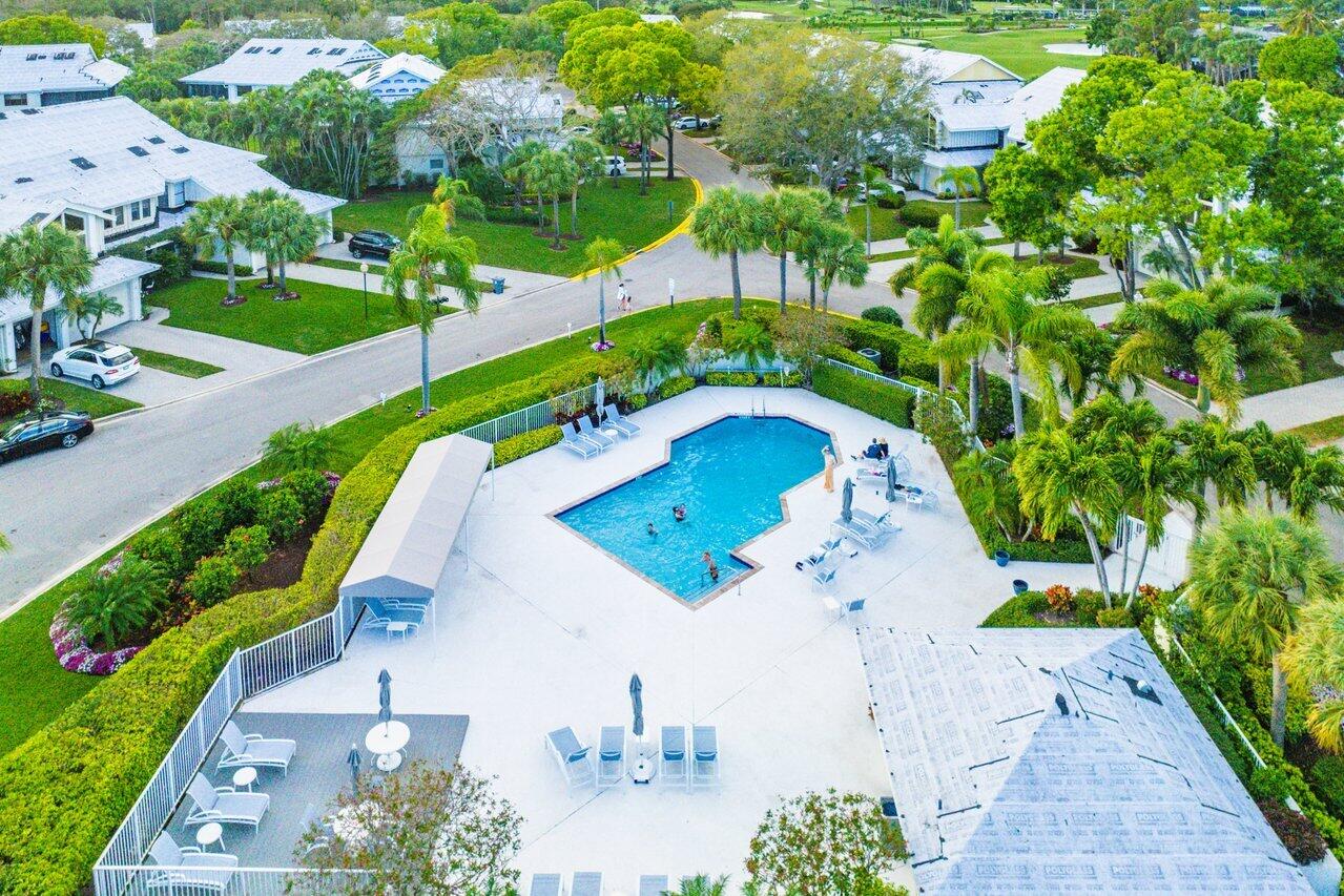 17557 Ashbourne Lane, Unit B Boca Raton, FL 33496 - Photo 36 of 41 an aerial view of a house with a yard and outdoor seating