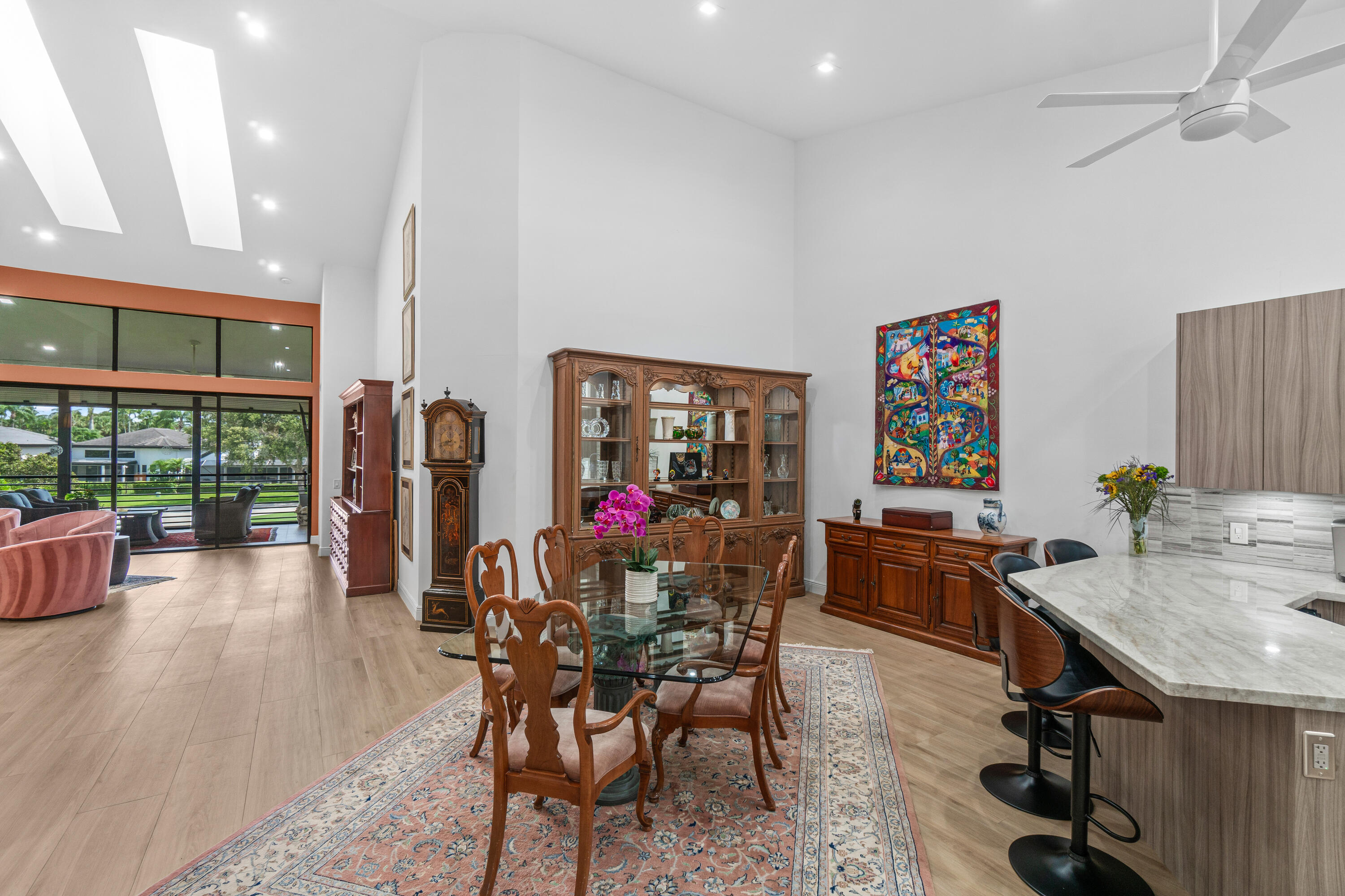 17557 Ashbourne Lane, Unit B Boca Raton, FL 33496 - Photo 6 of 41 a view of a dining room with furniture window and outside view