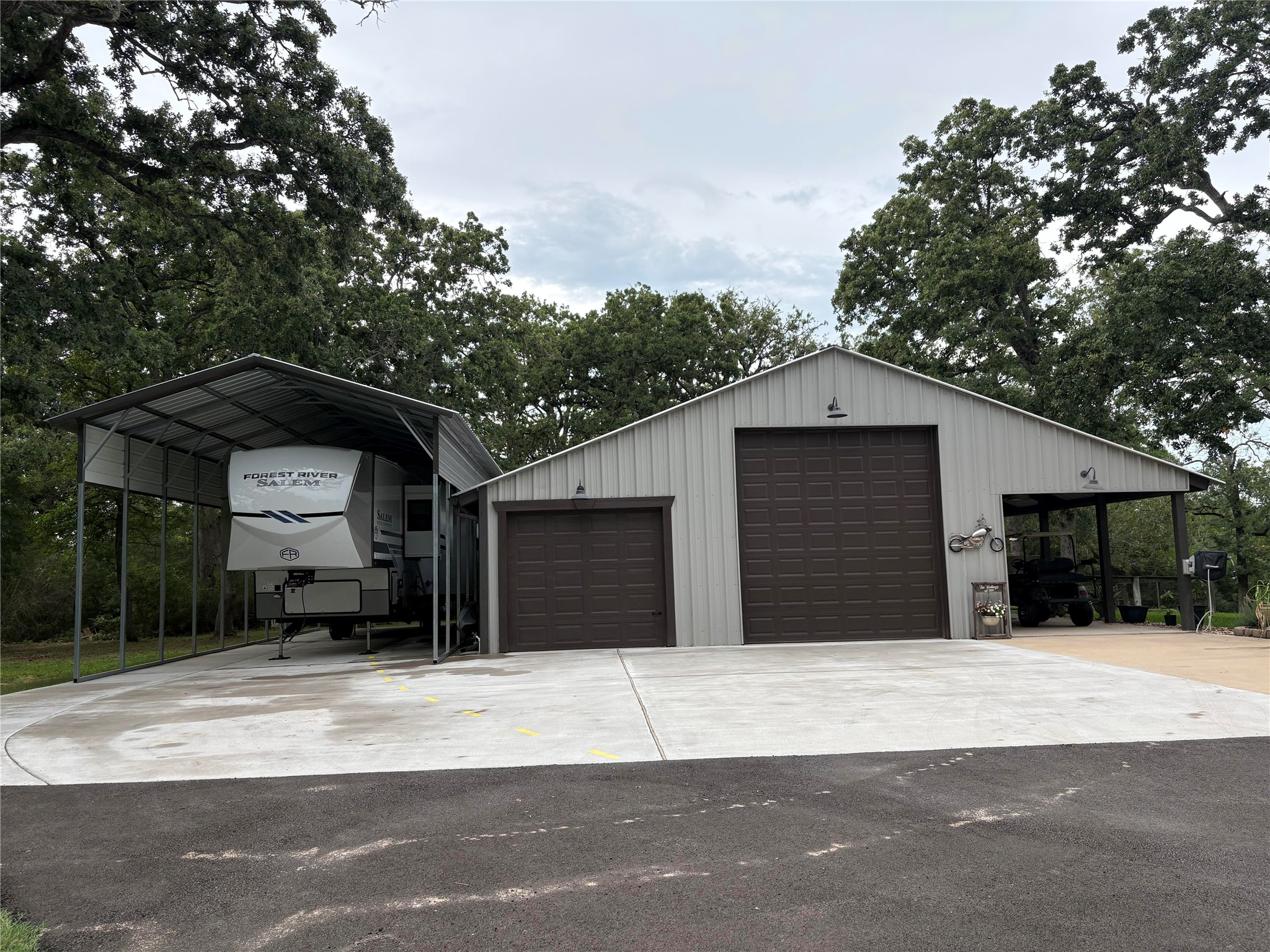 8595 Jared Road Bellville, TX 77418 - Photo 7 of 30 New 18' x 45' RV Cover with Concrete Pad and 50amp Plug and NEW Asphalt Driveway!