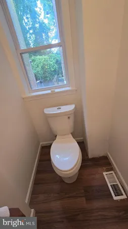 a view of bathroom with a toilet