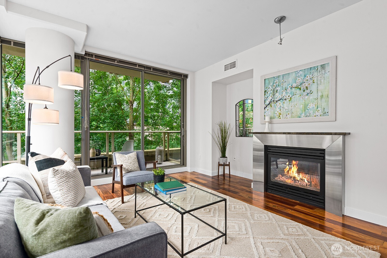 910 Lenora Street, Unit S403 Seattle, WA 98121 - Photo 13 of 40 a living room with furniture and a fireplace