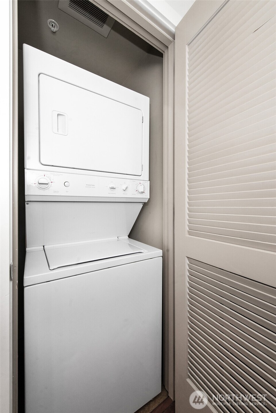 910 Lenora Street, Unit S403 Seattle, WA 98121 - Photo 21 of 40 a utility room with dryer and washer
